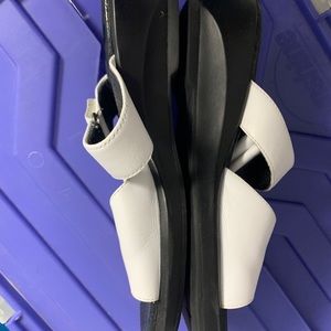 Clark brand gently used white slip on sandals size 8